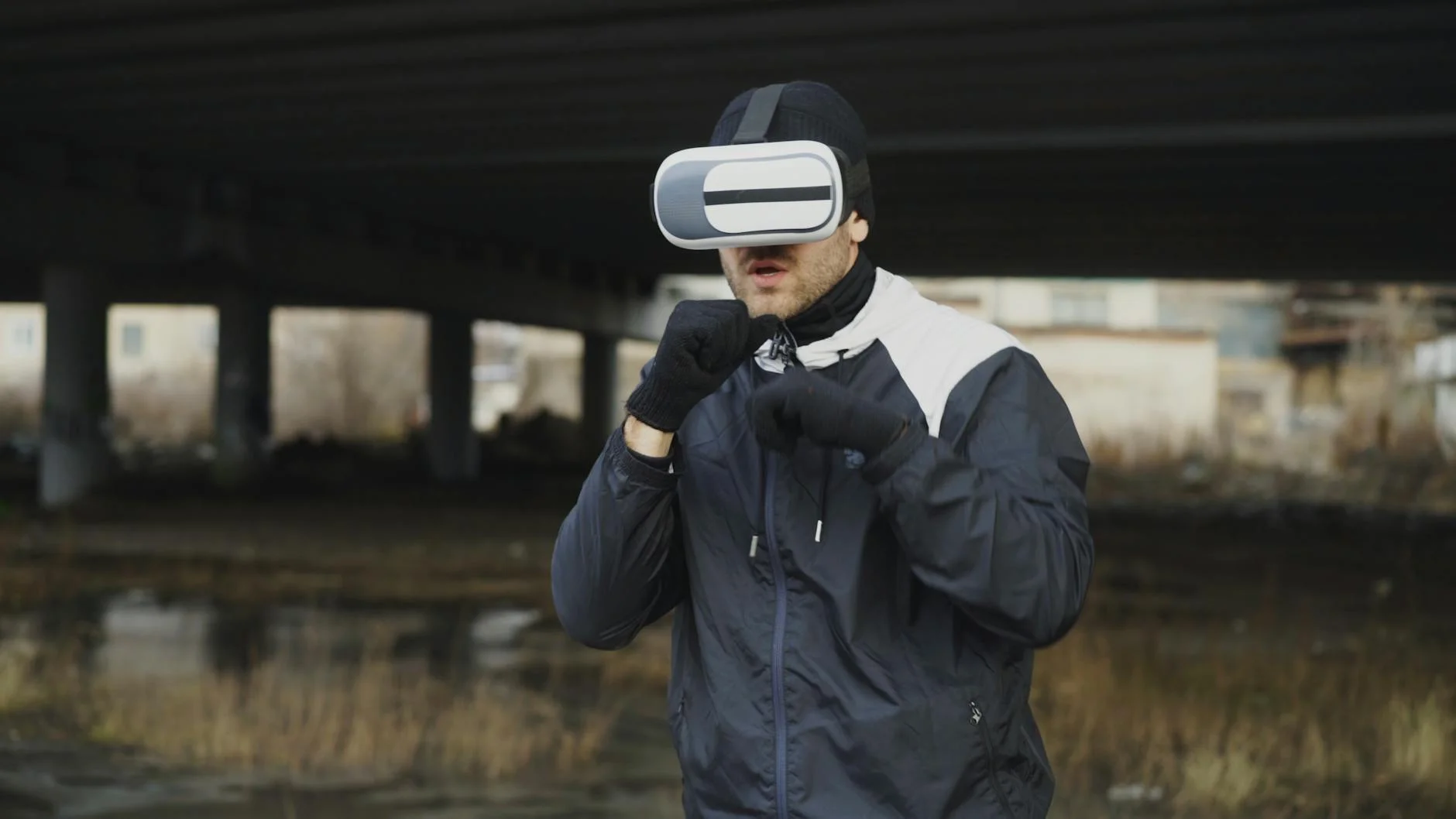 Person playing VR sports game with virtual reality headset